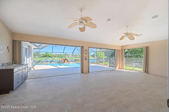 a bathroom with a granite countertop sink mirror and double