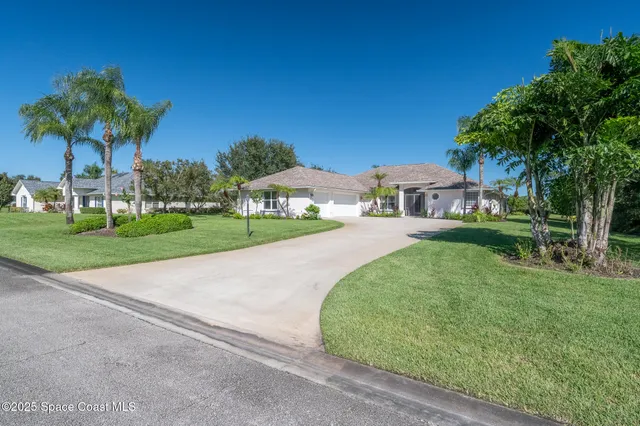 a house with garden in front of it