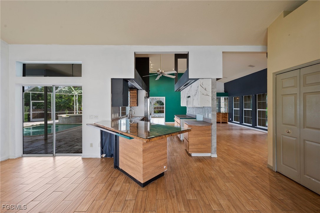 1981 Carbonata Drive Alva, FL 33920 - Photo 12 of 50 a living room with furniture and a wooden floor