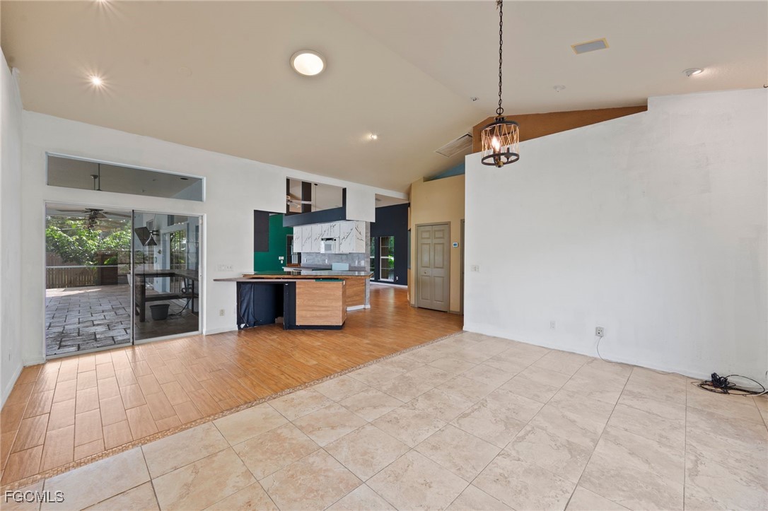 1981 Carbonata Drive Alva, FL 33920 - Photo 14 of 50 a view of kitchen with refrigerator and window