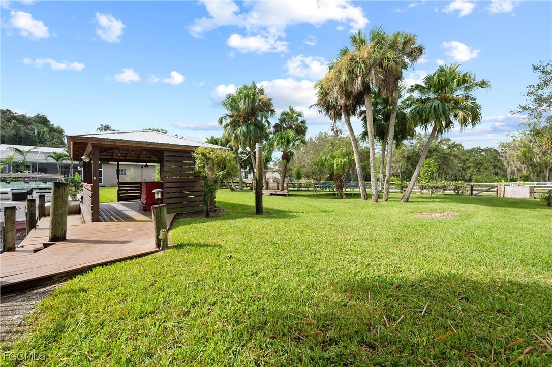 1981 Carbonata Drive Alva, FL 33920 - Photo 33 of 50 a view of a park with swings and slides