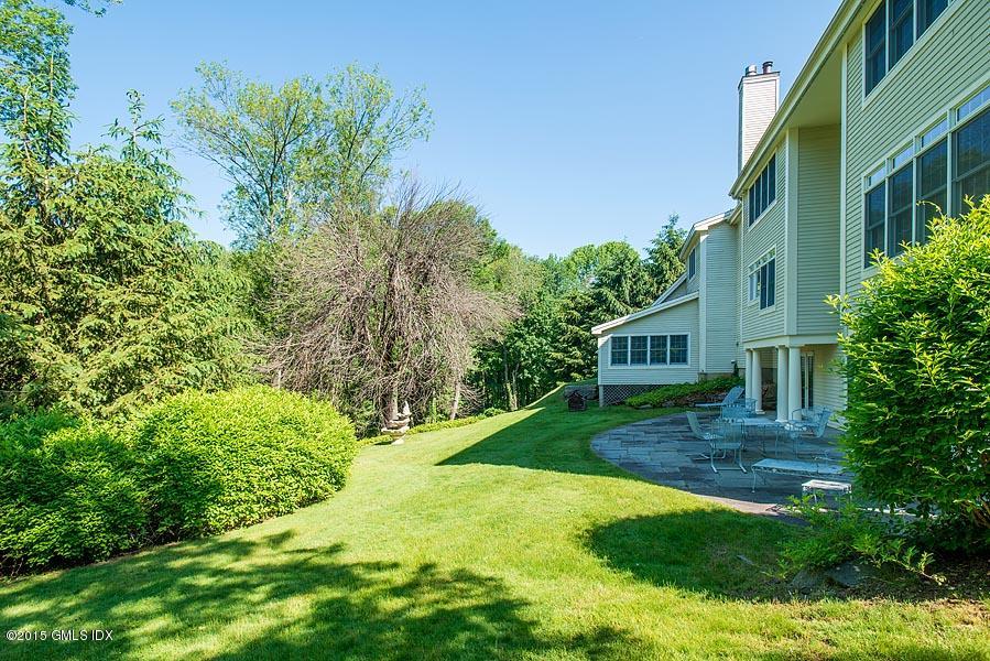108 Cutler Road Greenwich, CT 06831 - Photo 13 of 15 a view of a house with a yard