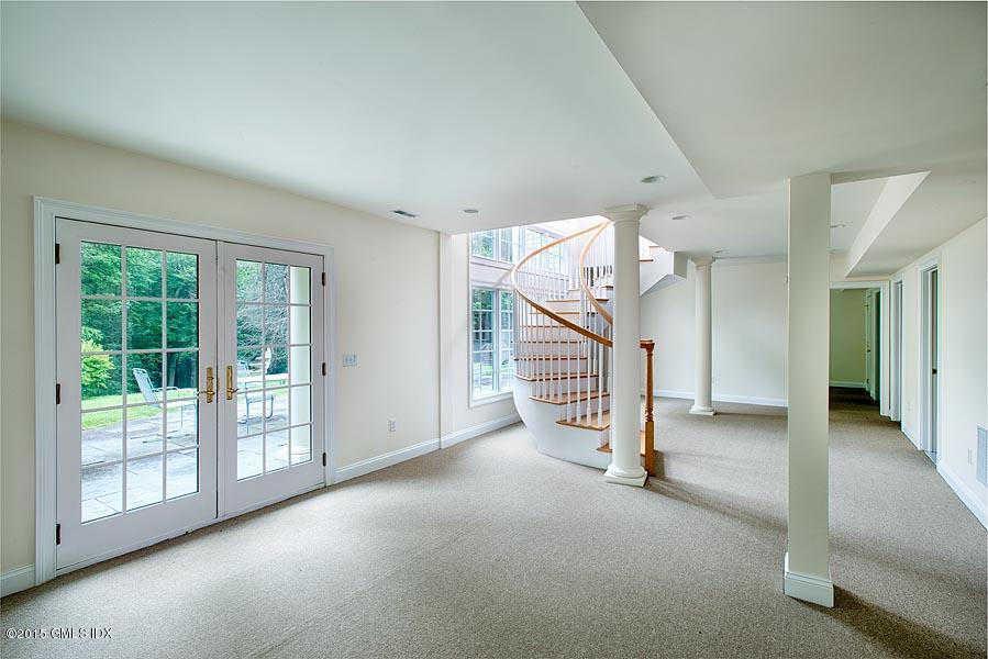 108 Cutler Road Greenwich, CT 06831 - Photo 9 of 15 a view of a livingroom with a staircase