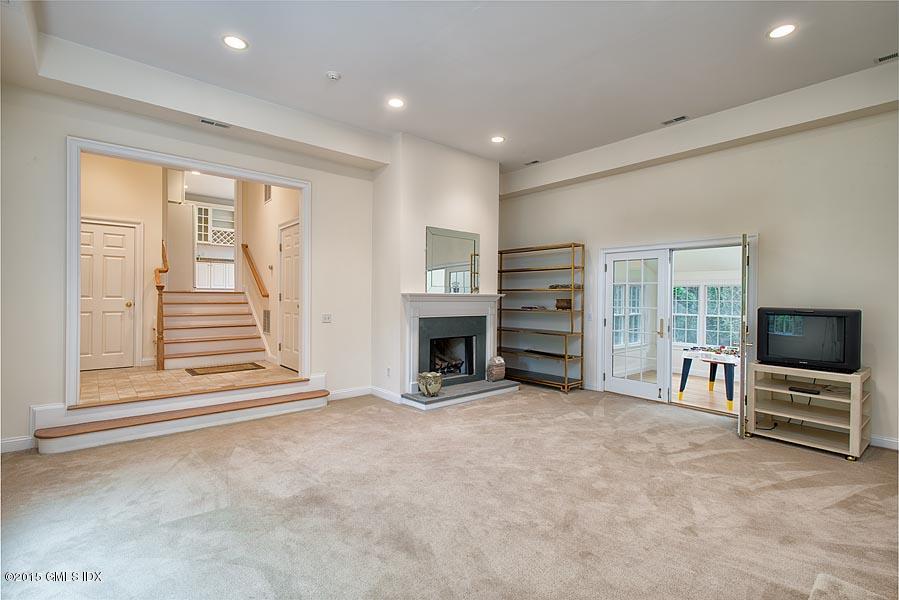 108 Cutler Road Greenwich, CT 06831 - Photo 10 of 15 a view of a livingroom with a fireplace