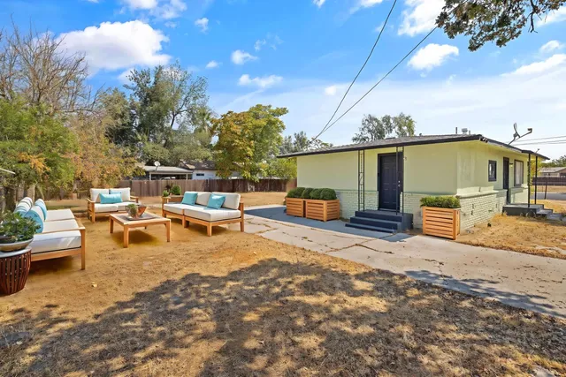 a view of a house with a patio
