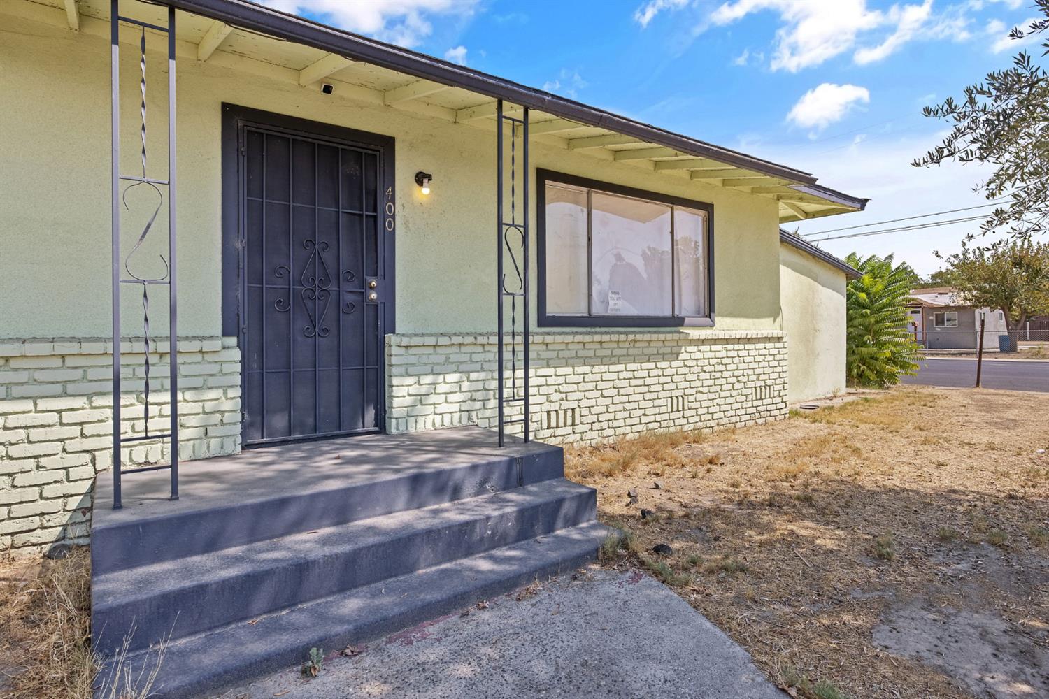 400 Scott Street Hanford, CA 93230 - Photo 5 of 35 a view of a house with a yard