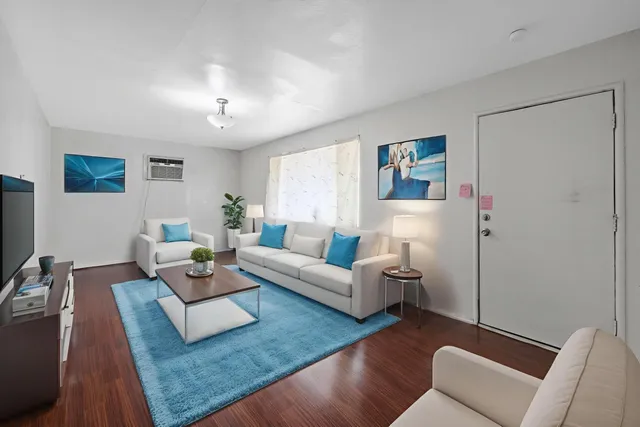 a living room with furniture and a couch