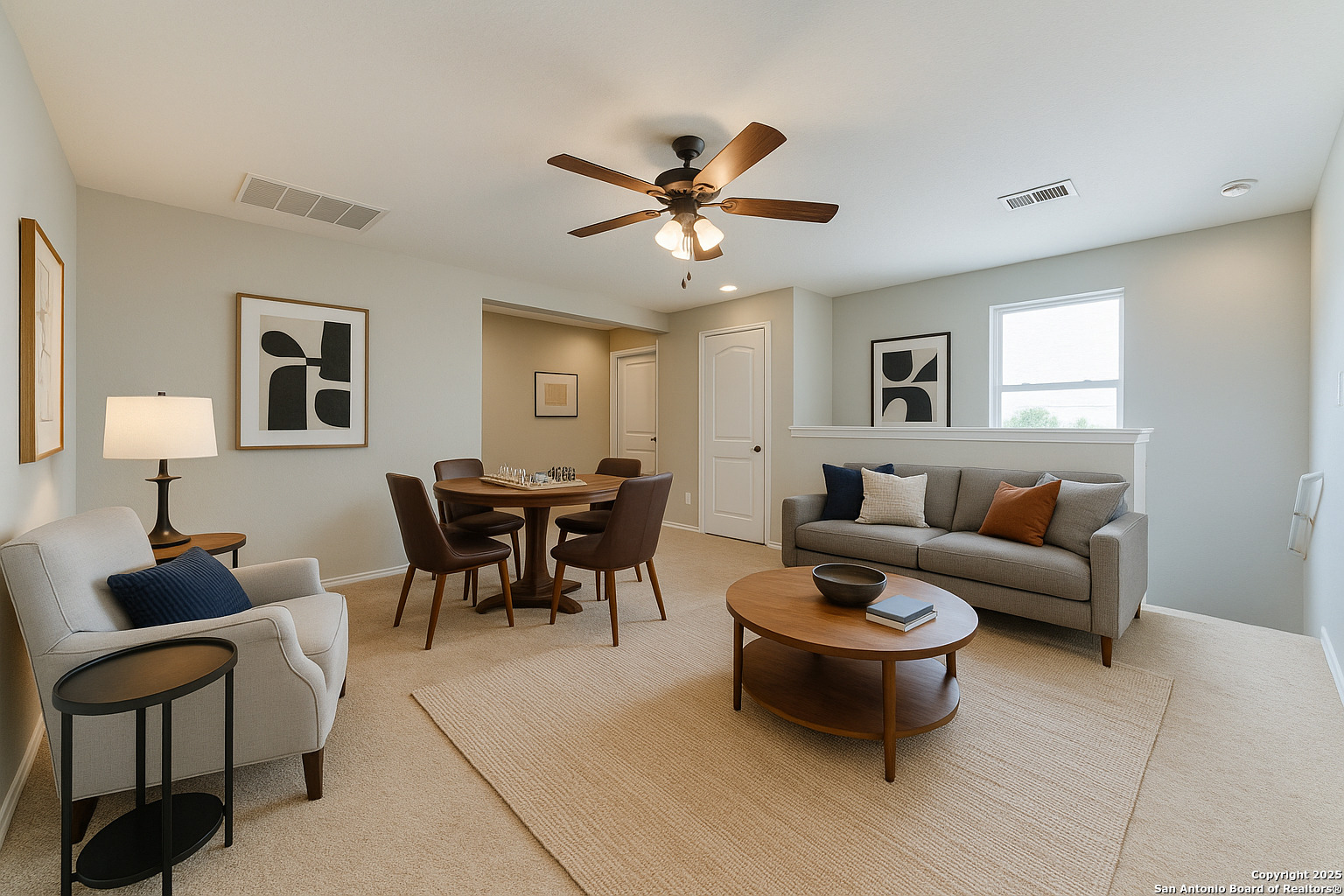 153 Rattlesnake Bluff Boerne, TX 78006 - Photo 11 of 18 a living room with furniture a lamp and a window