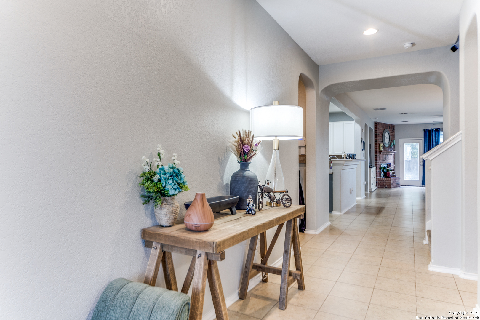 153 Rattlesnake Bluff Boerne, TX 78006 - Photo 2 of 18 a view of a dining room with furniture and a potted plant