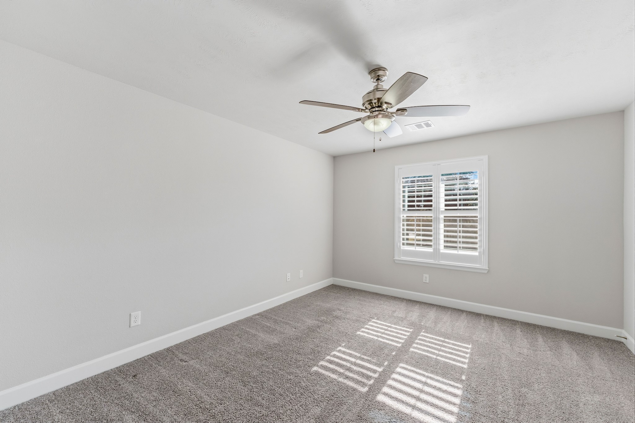 2607 Nicholson Street Houston, TX 77008 - Photo 24 of 29 a view of an empty room with a window