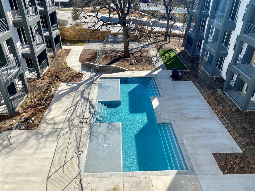 4801 Springdale Road, Unit 2408 Austin, TX 78723 - Photo 16 of 22 a view of entryway with wooden floor