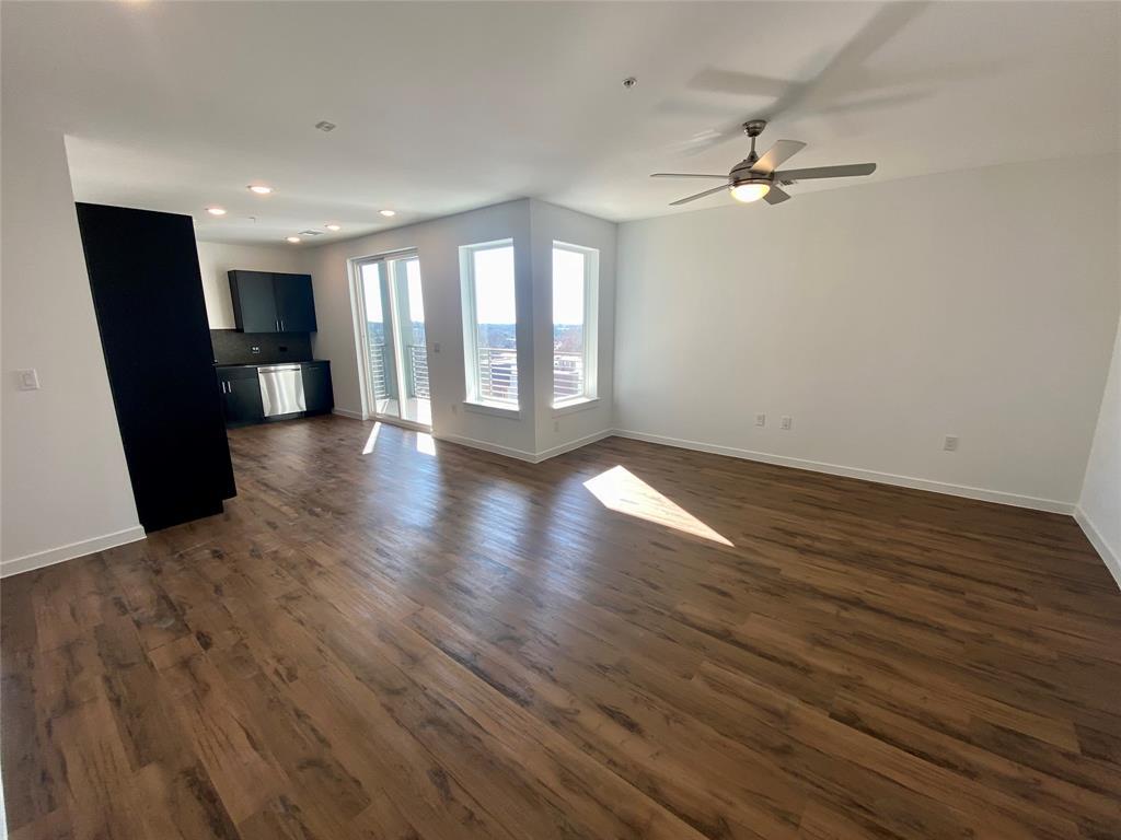 4801 Springdale Road, Unit 2408 Austin, TX 78723 - Photo 3 of 22 a view of livingroom with hardwood floor and window