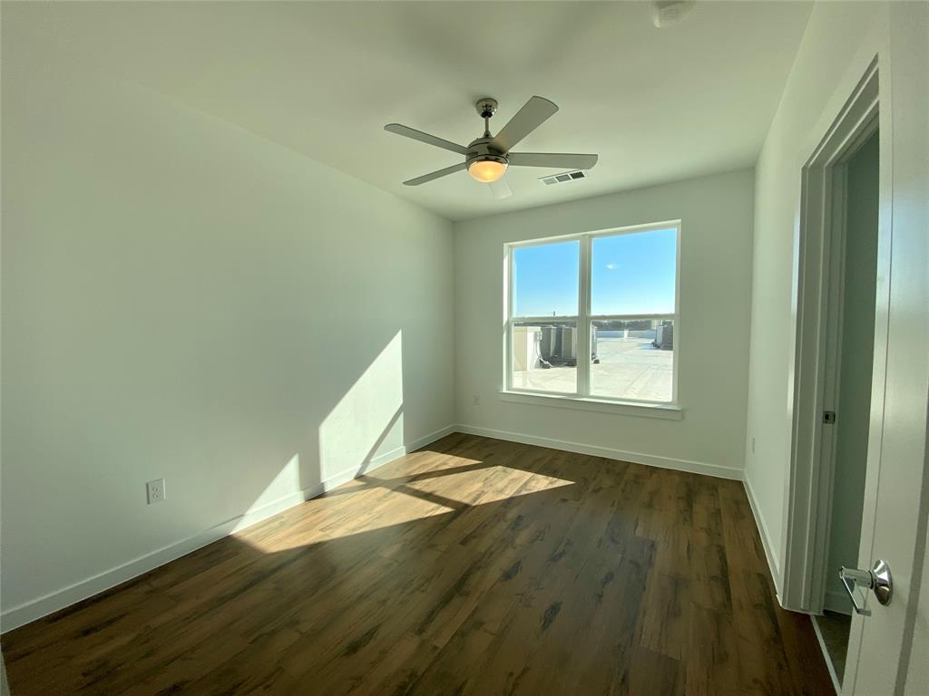 4801 Springdale Road, Unit 2408 Austin, TX 78723 - Photo 5 of 22 a view of an empty room and window
