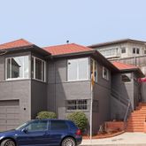 a front view of a house with yard