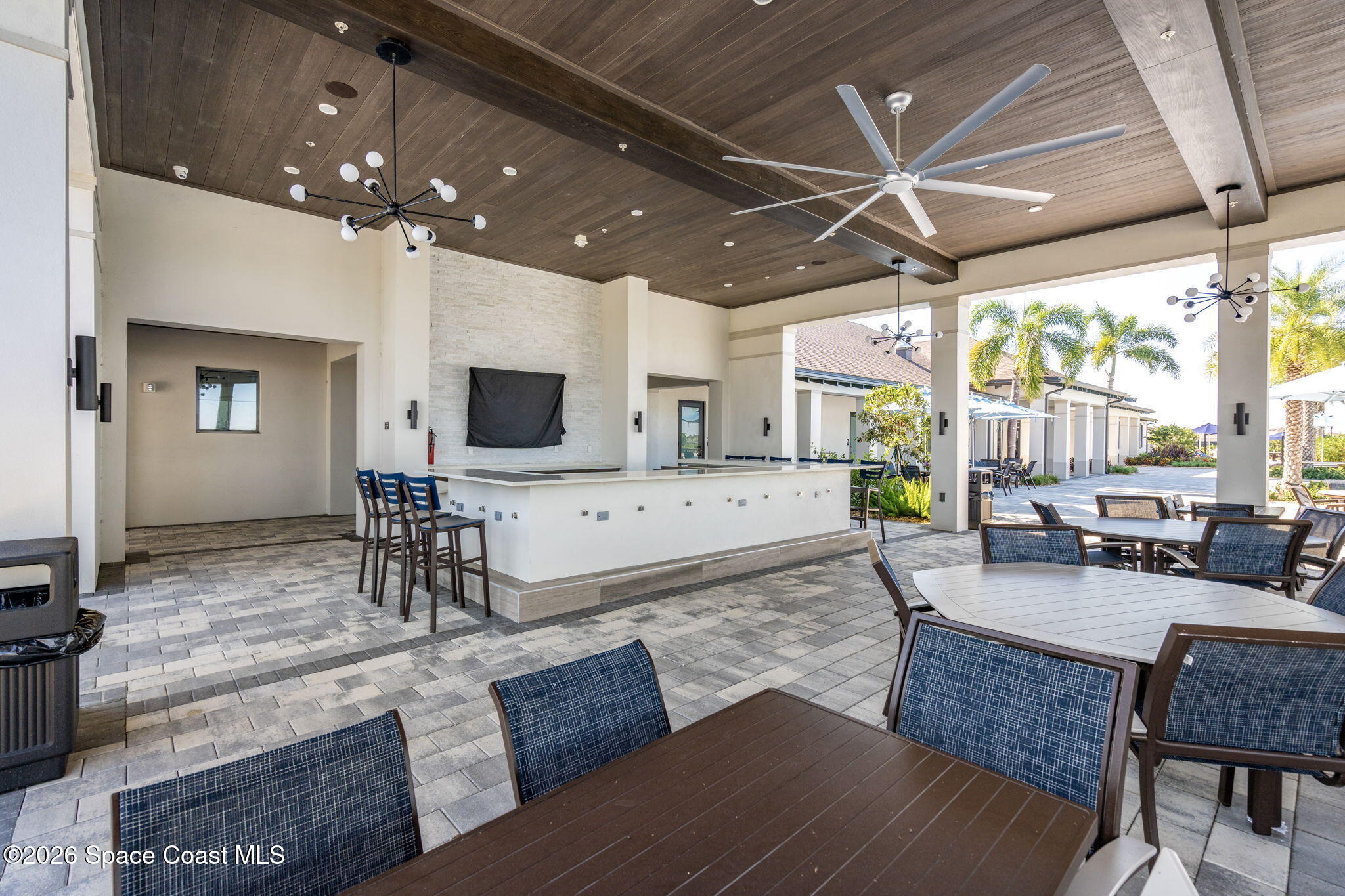 8904 Alister Drive Melbourne, FL 32940 - Photo 66 of 91 a living room with furniture and a flat screen tv