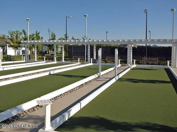 a view of an outdoor space and tennis court