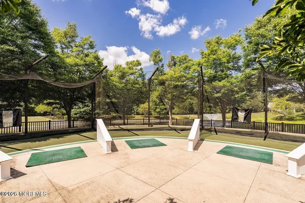 a view of a lake with a house in the background