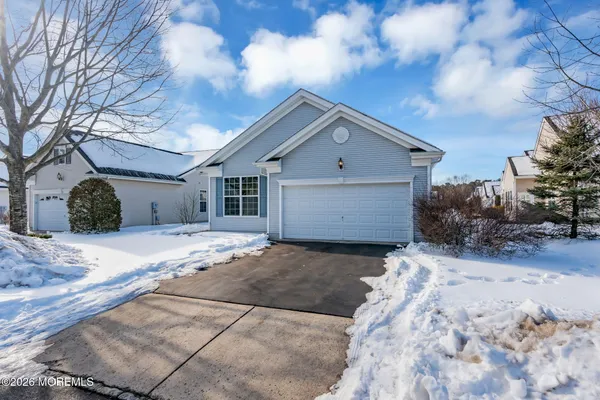a view of a hallway with windows