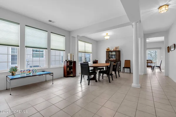 a view of a dining room with furniture