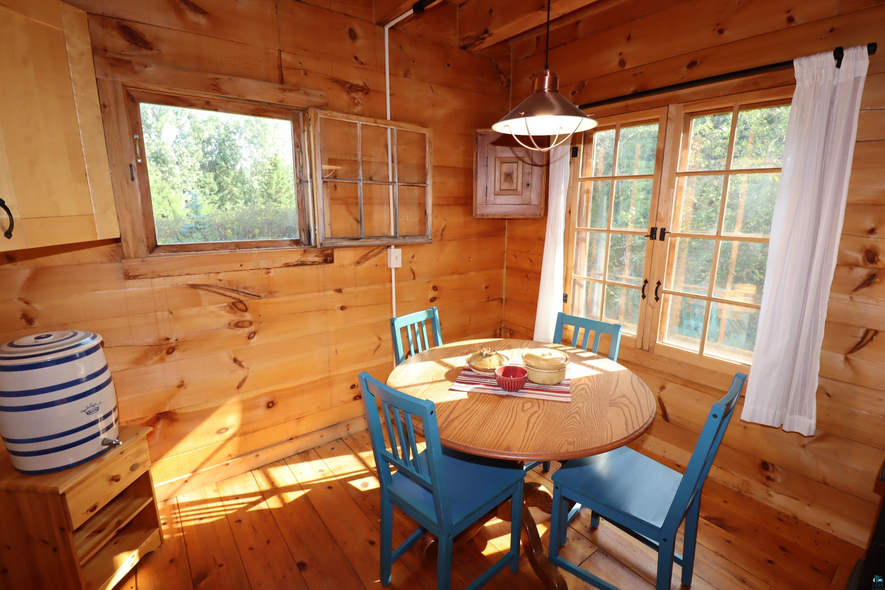89595 Bark Point Road Herbster, WI 54844 - Photo 16 of 43 Dining area with a healthy amount of sunlight