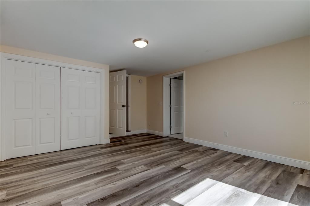 1353 Mary L Road Clearwater, FL 33755 - Photo 18 of 44 a view of a livingroom with an empty space and a window