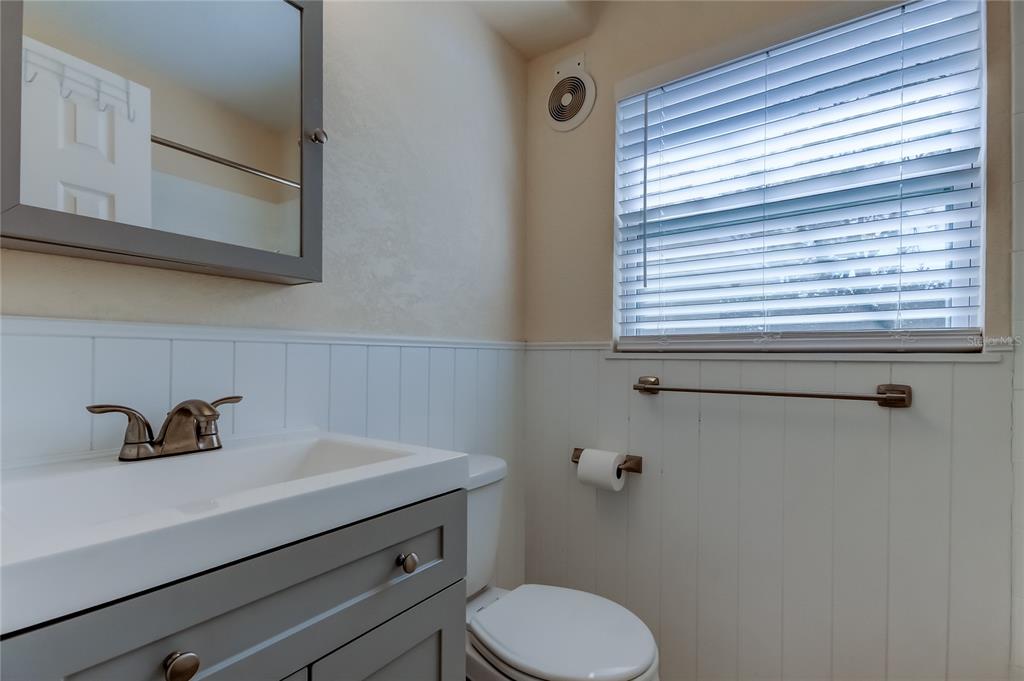 1353 Mary L Road Clearwater, FL 33755 - Photo 37 of 44 a bathroom with a sink and a toilet