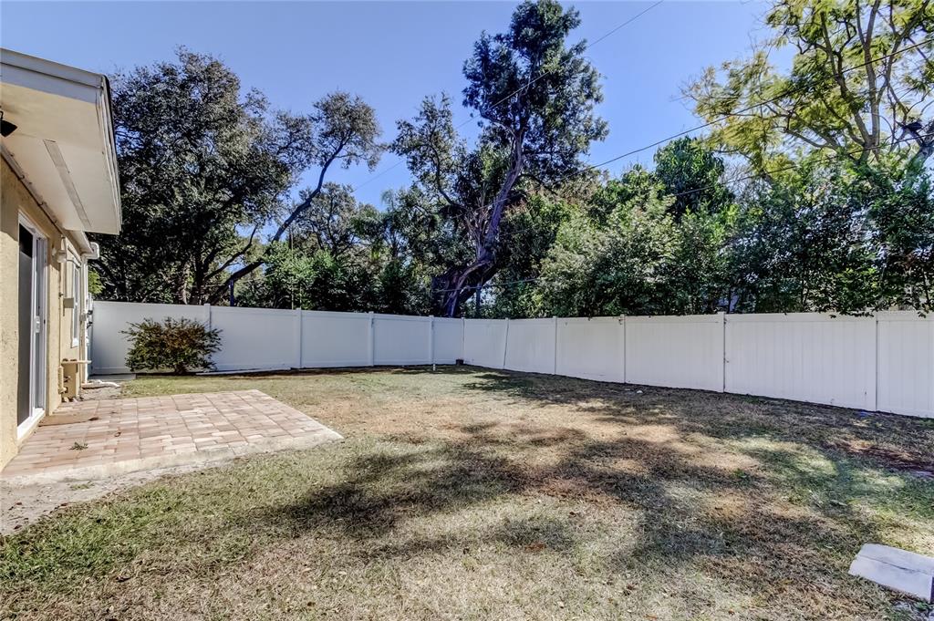 1353 Mary L Road Clearwater, FL 33755 - Photo 42 of 44 a backyard of a house