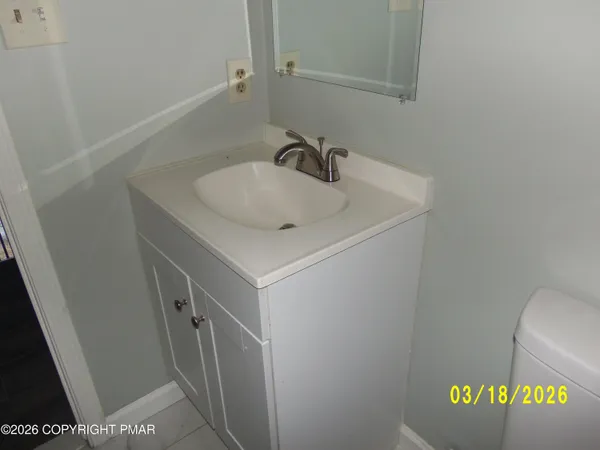 a bathroom with a sink and a vanity