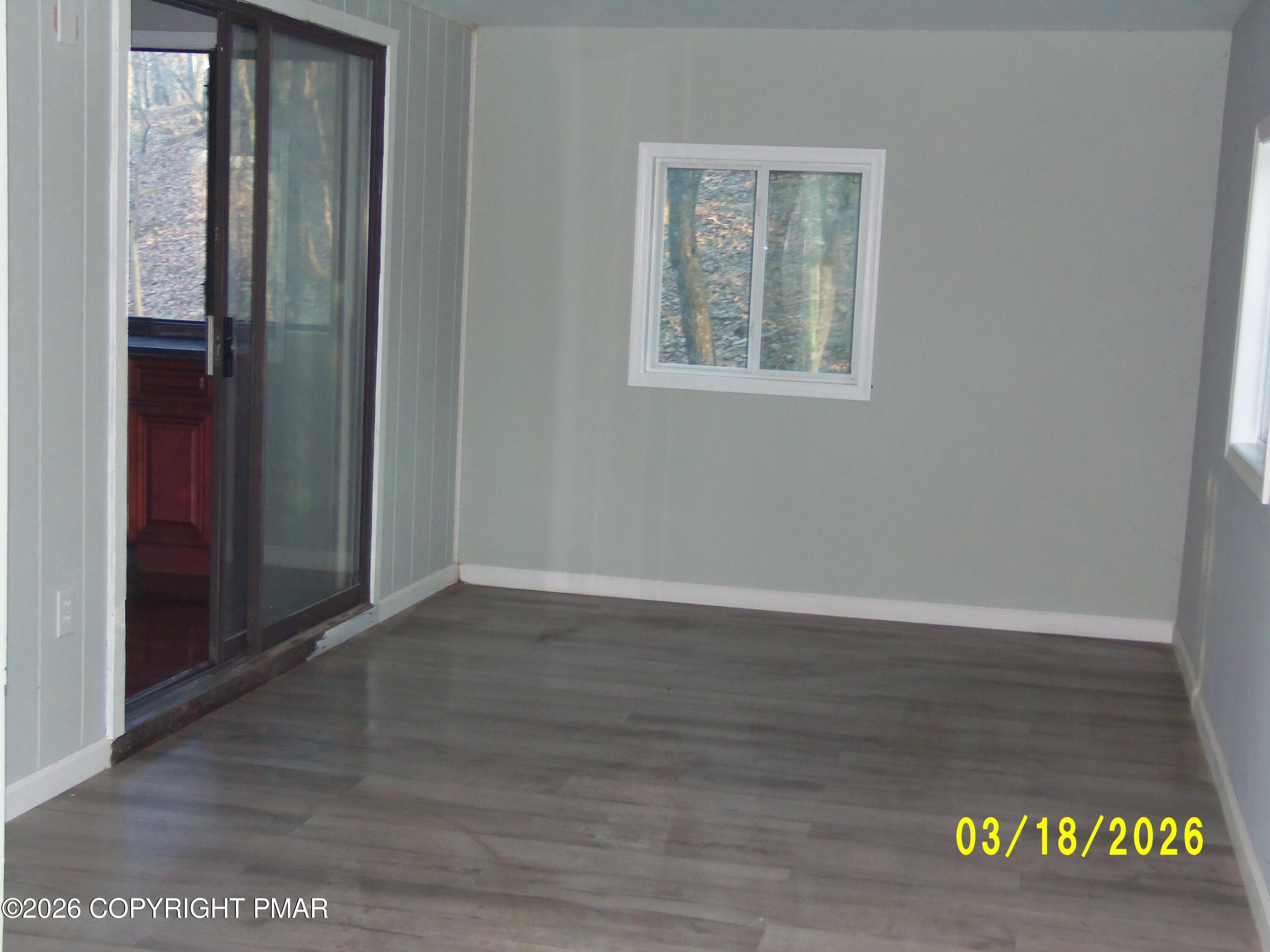240 Powder Horn Road Henryville, PA 18332 - Photo 10 of 23 an empty room with wooden floor and closet