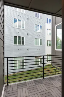 a view of a brick building from a balcony