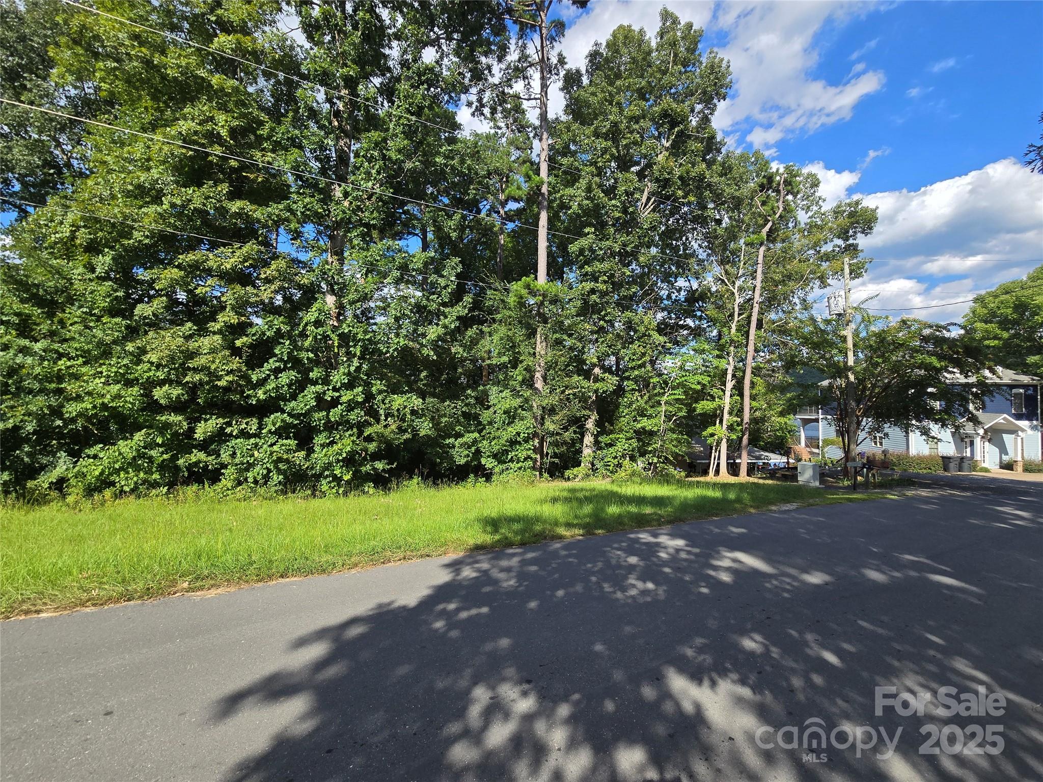 0 Shoreline Road, Unit 107 Badin Lake, NC 28127 - Photo 24 of 48 a view of a park