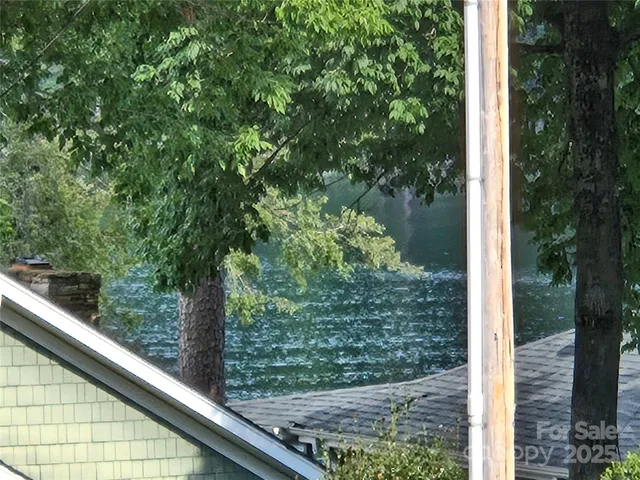 a view of a garden with an tree