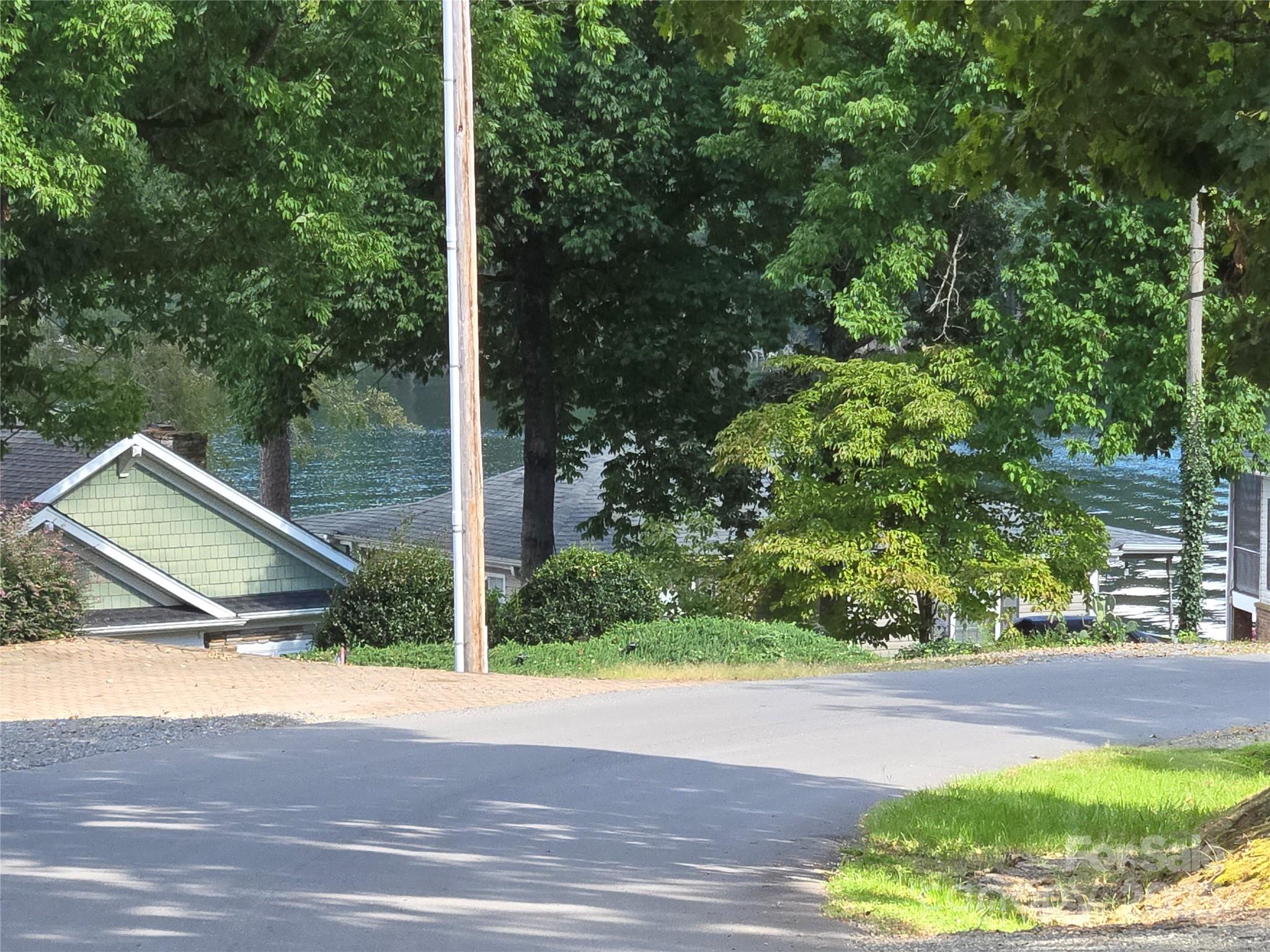 0 Shoreline Road, Unit 107 Badin Lake, NC 28127 - Photo 28 of 48 a view of outdoor space and yard