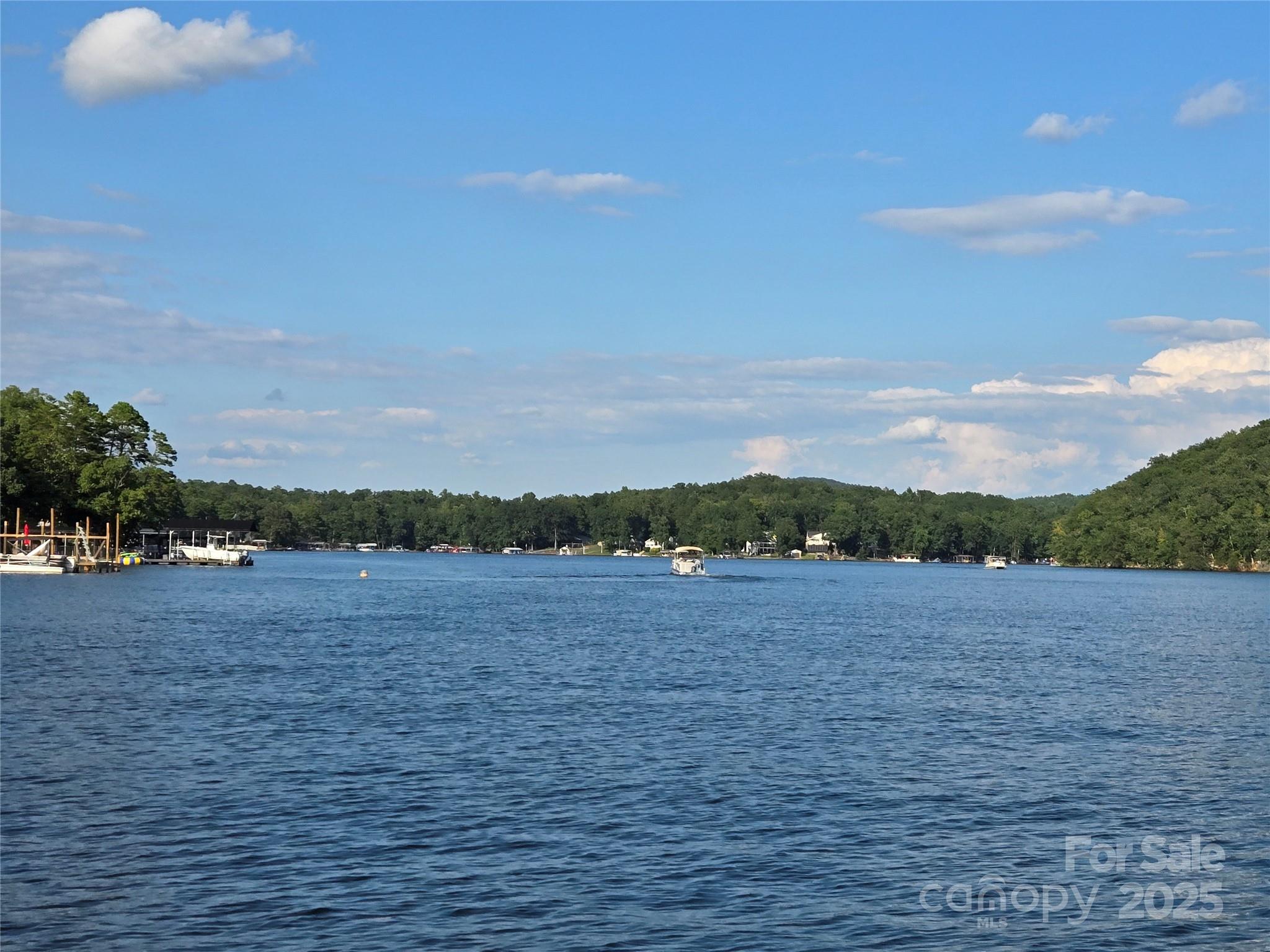 0 Shoreline Road, Unit 107 Badin Lake, NC 28127 - Photo 34 of 48 a view of an outdoor space and mountain view