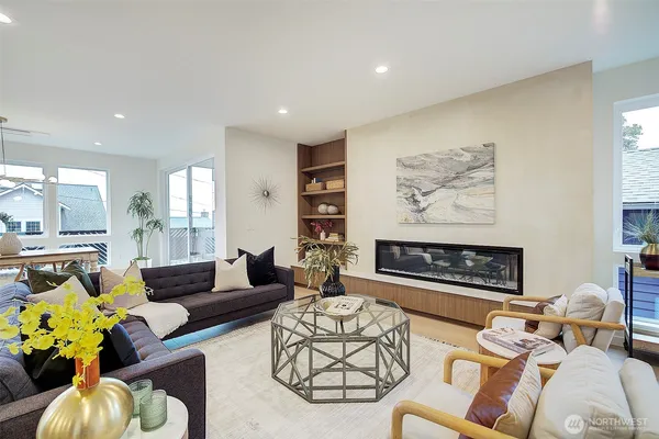 a workspace with furniture and a potted plant