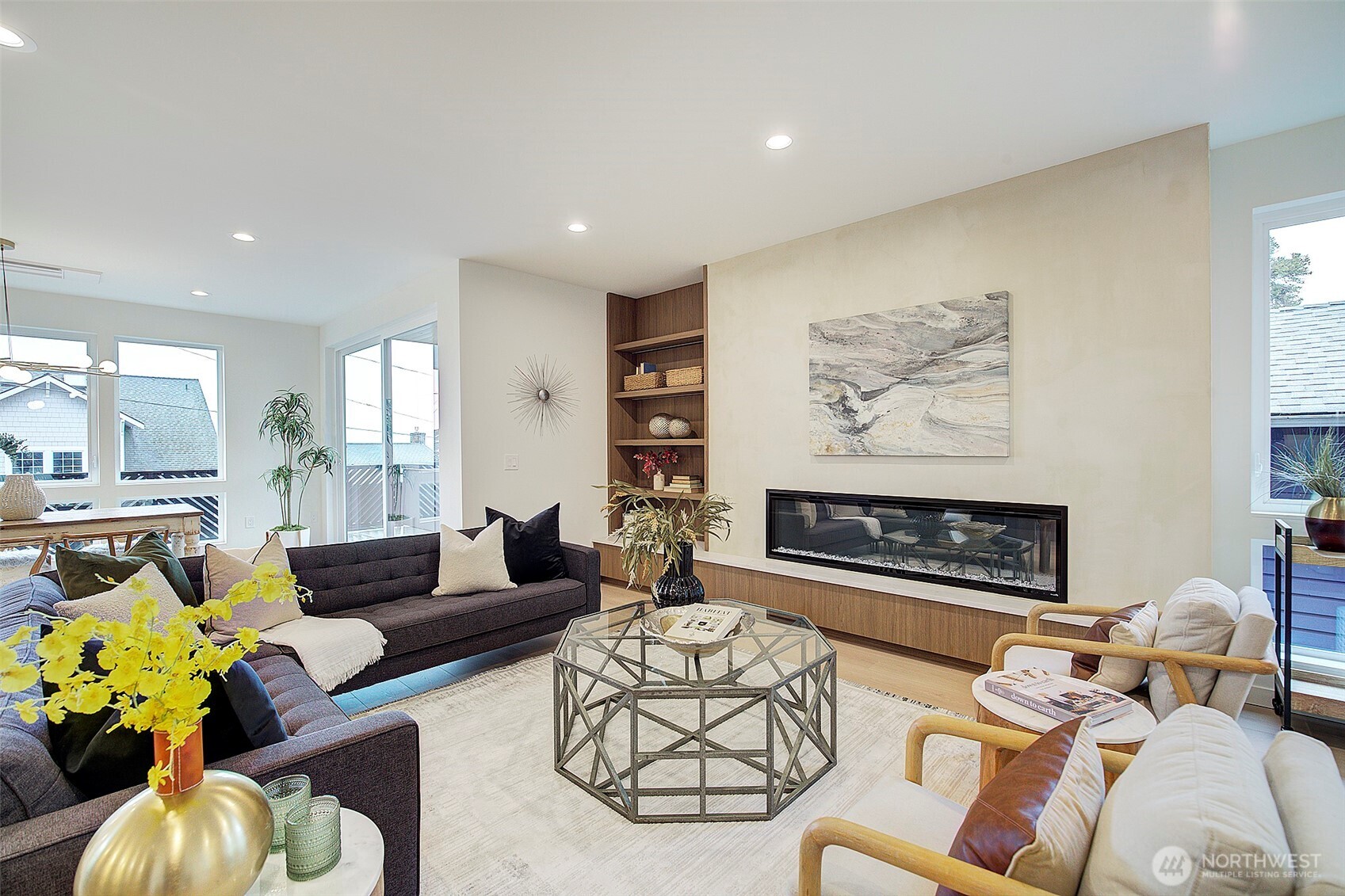 7341 California Avenue Southwest Seattle, WA 98136 - Photo 6 of 40 a living room with furniture potted plant and a fireplace