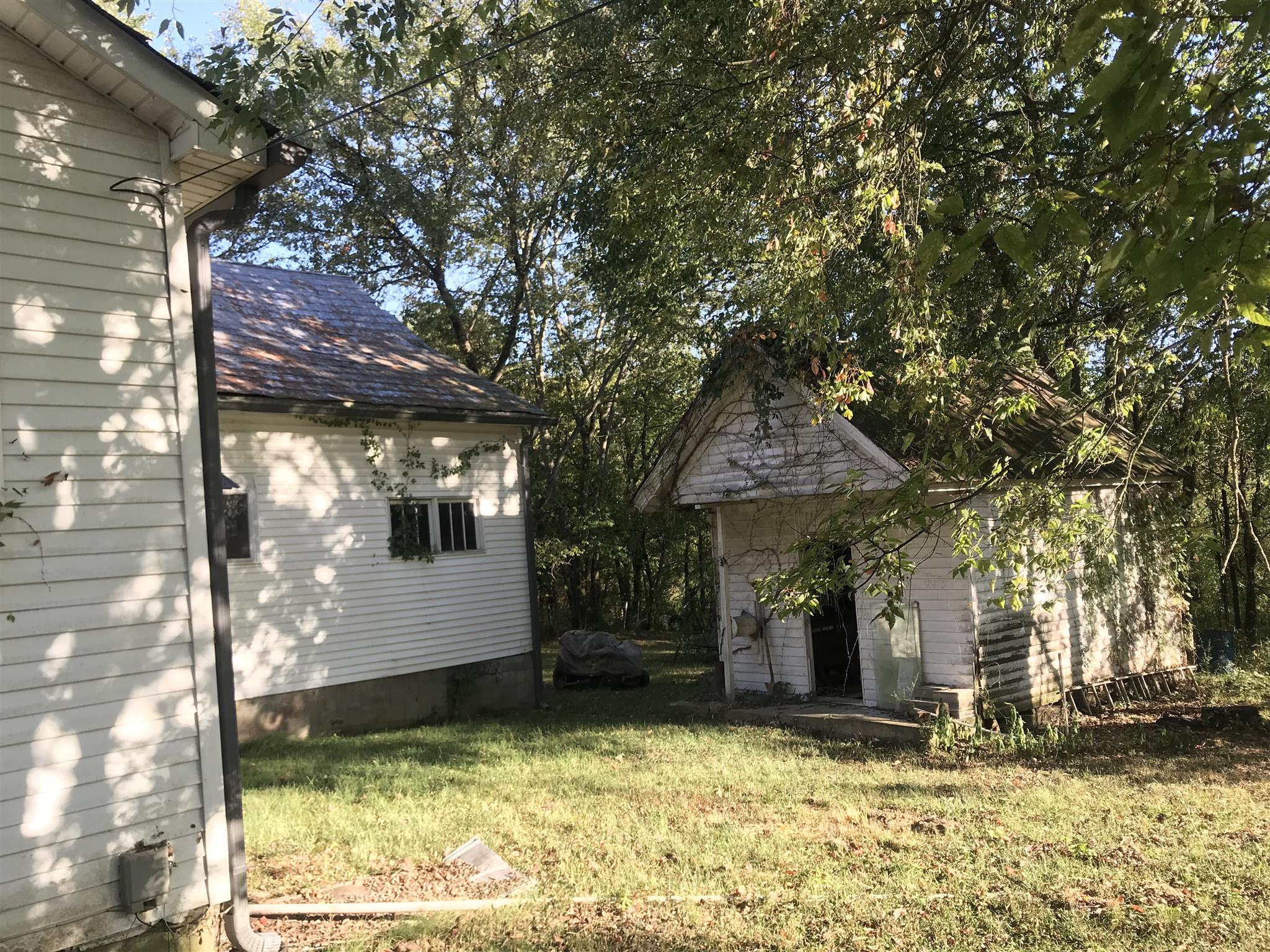 148 Hayes Ridge Road Lancaster, TN 38569 - Photo 5 of 9 a view of a house with a yard