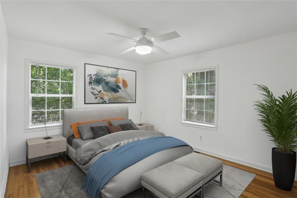2130 Main Street Northwest Atlanta, GA 30318 - Photo 10 of 17 a bedroom with a large bed and a window