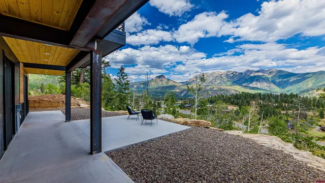 a view of a swimming pool with a lounge chairs