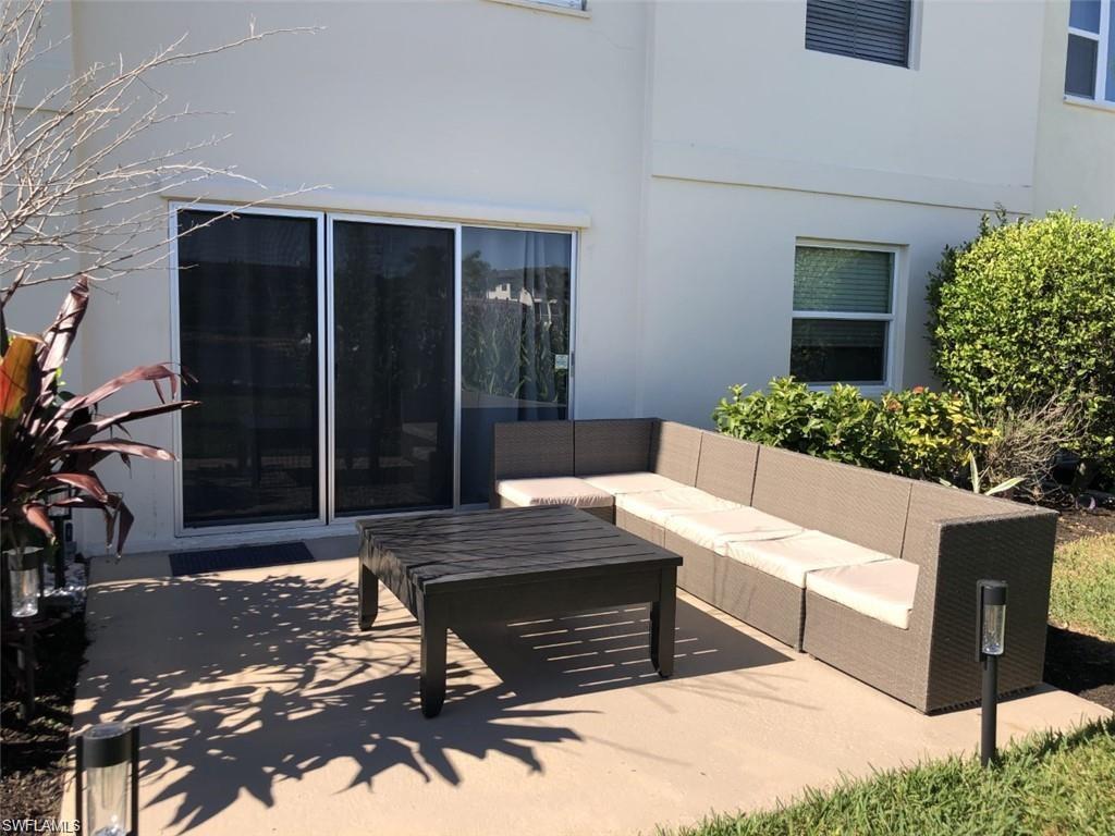 1000 Manatee Road, Unit A105 Naples, FL 34114 - Photo 13 of 22 a view of house and outdoor space
