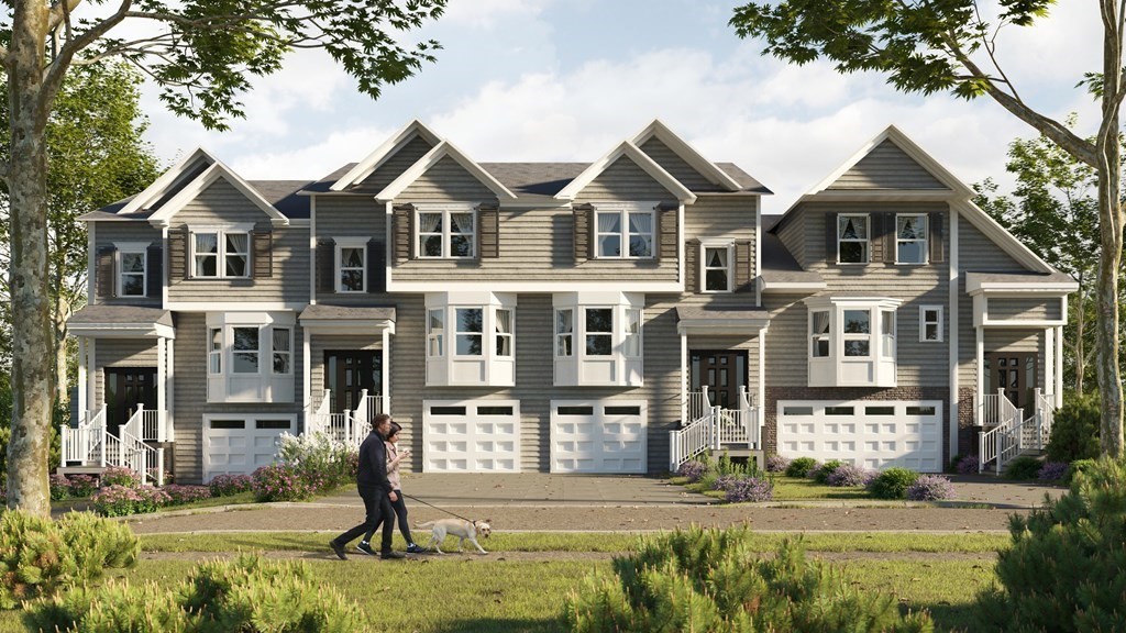 11 Audubon Way Canton, MA 02021 - Photo 2 of 10 a front view of a house with a yard