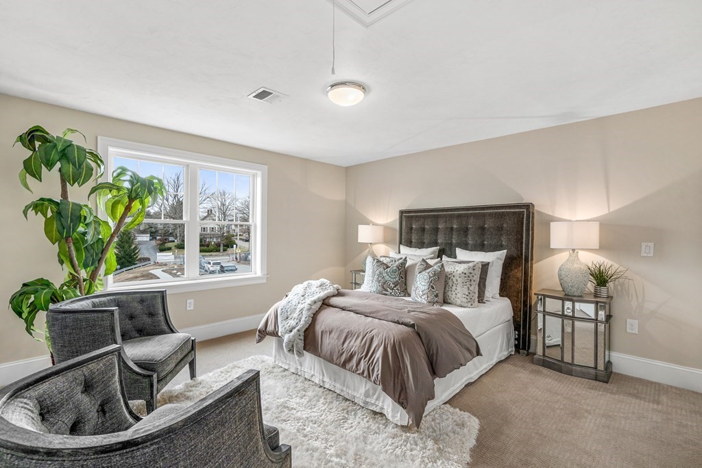 11 Audubon Way Canton, MA 02021 - Photo 3 of 10 a bedroom with a bed and a window