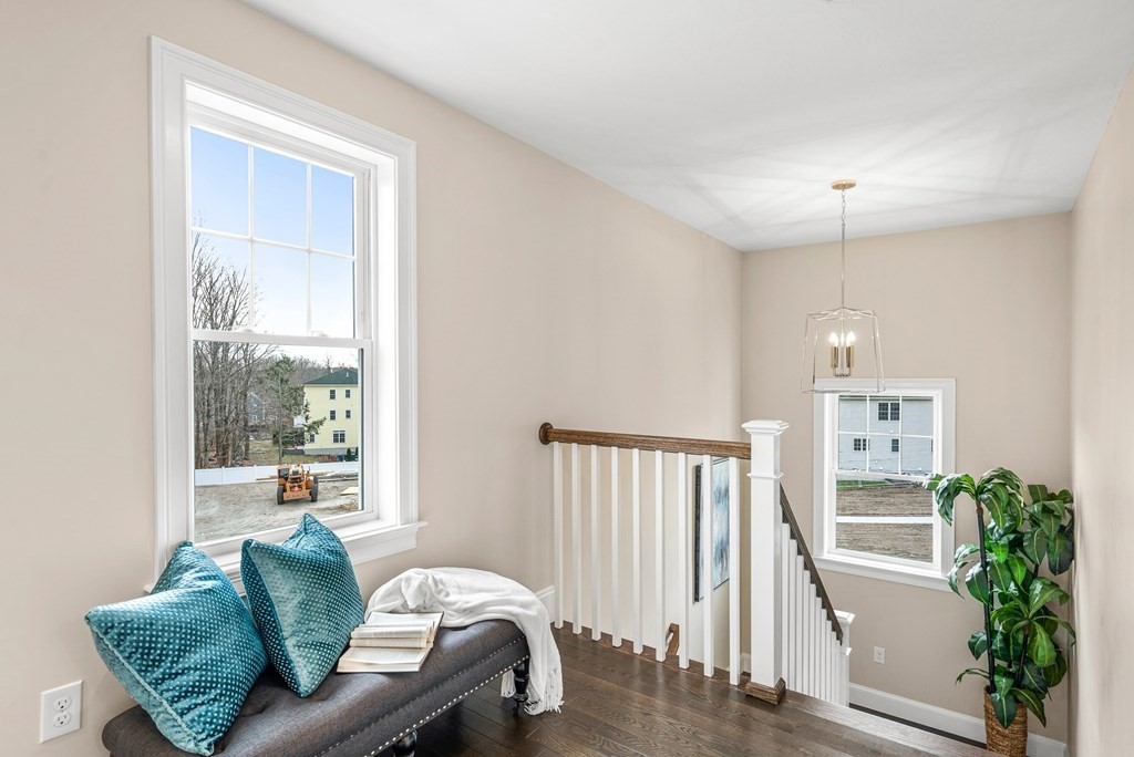 11 Audubon Way Canton, MA 02021 - Photo 6 of 10 a living room with furniture and a large window