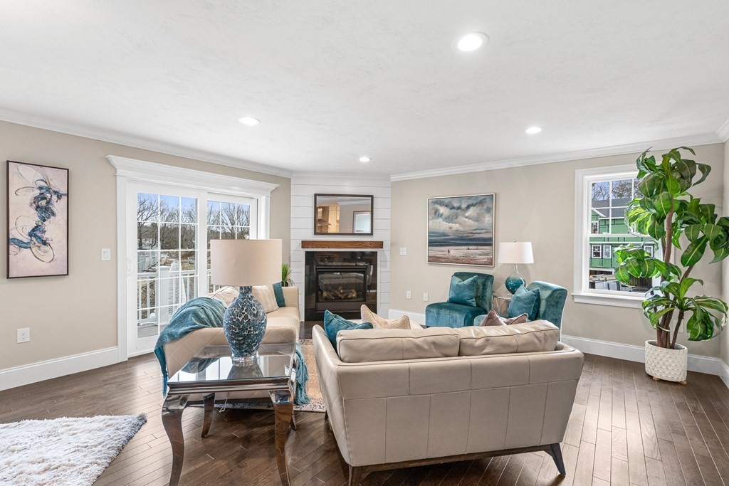 11 Audubon Way Canton, MA 02021 - Photo 8 of 10 a living room with furniture potted plant and a window