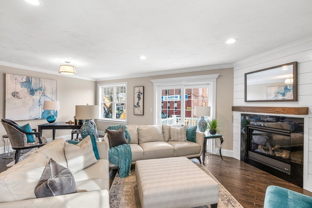 11 Audubon Way Canton, MA 02021 - Photo 9 of 10 a living room with furniture a window and a fireplace