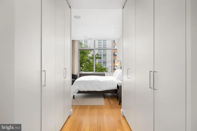 a bathroom with a bathtub and a window