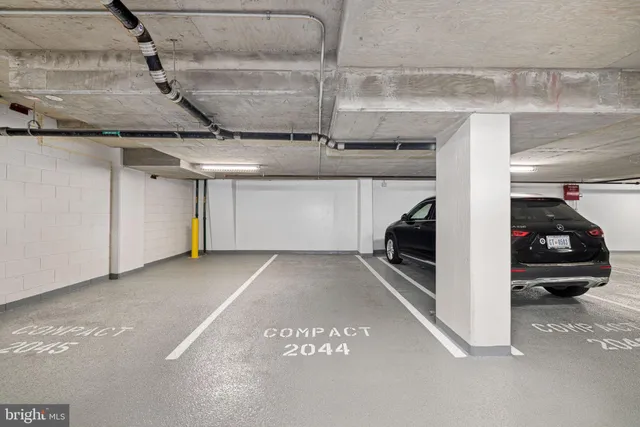 a view of a swimming pool with a lounge chair