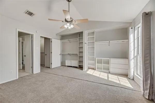 a view of an empty room with a fireplace