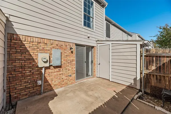 a front view of a house with parking