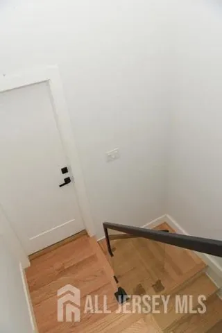 a bathroom with a shower and a toilet